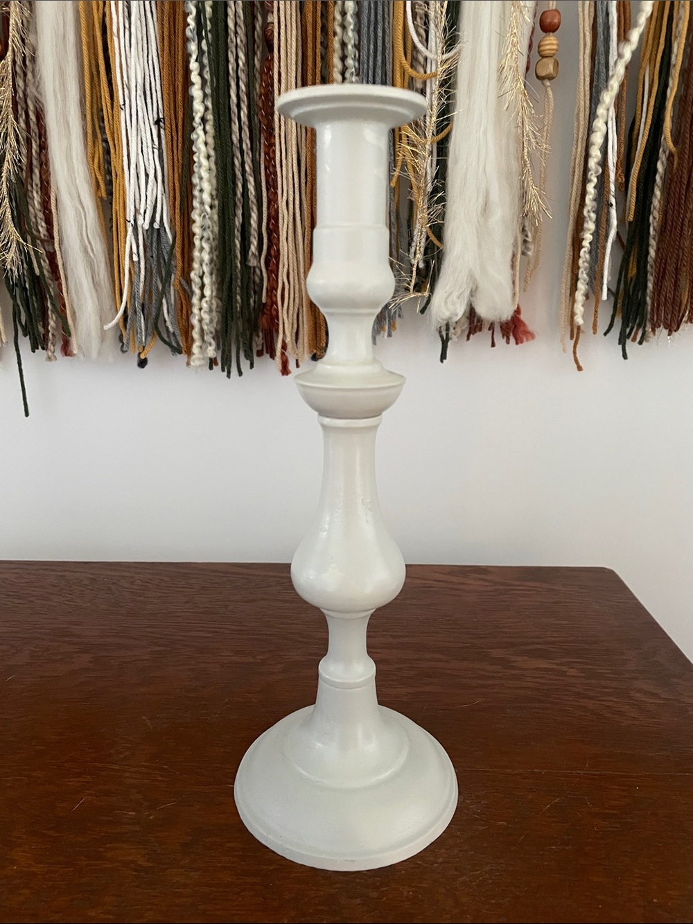 Flat grey metal candlestick